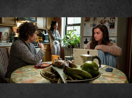 Marta at the family table in Knives Out Anastasia Morgan, game writer, narrative designer, novelist, short story writer, inkslinger